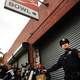On Oct. 24, 2014, police keep members of the media and others back from the closed Brooklyn bowling alley that Dr. Craig Spencer, New York City’s first Ebola patient, visited before showing symptoms of the virus.
Spencer Platt/Getty Images